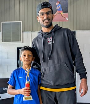NAT Program Coordinator Ray Sivakumar, with U10 athlete Taha Ali-WR